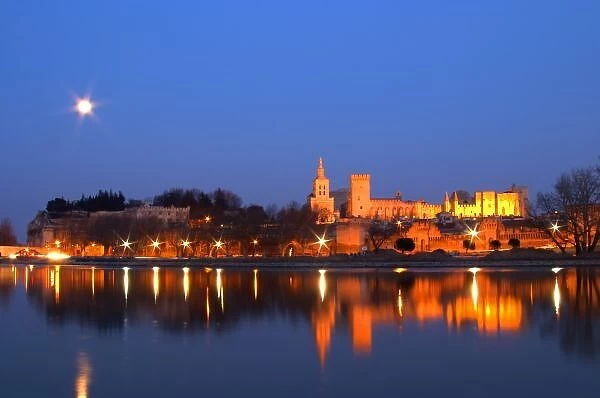 Popes Palace in Avignon and the Rhone river at sunset with moon, Vaucluse, Rhone