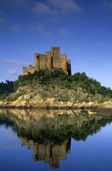 Portugal, Almourol. Castelo do Almourol (built 1171) reflected in Tagus River