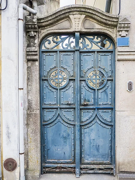 Portugal, Aveiro. A unique metal door on a home in the streets of Aveiro