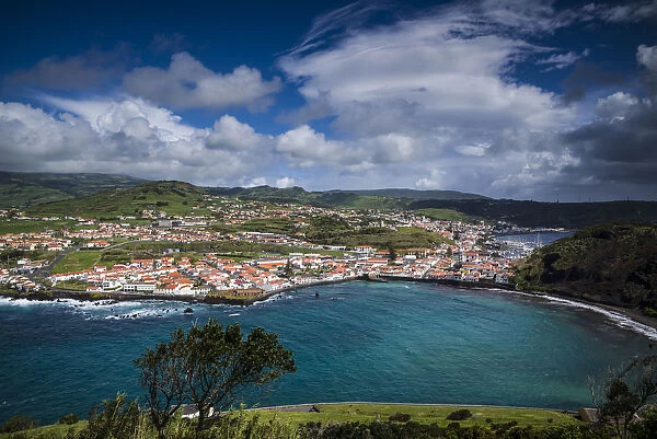 Portugal, Azores, Faial Island, Horta. Elevated view of town and Porto Pim from Monte