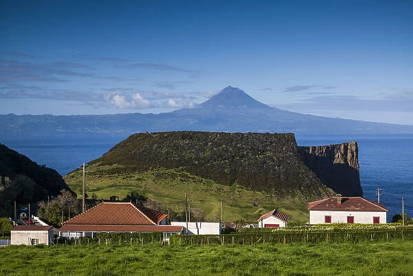 Portugal, Azores, Sao Jorge Island. Baia dos Arraias, view towards Pico Volcano