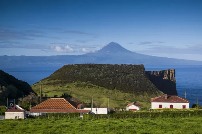 Framed Print : Portugal, Azores, Sao Jorge Island. Baia dos Arraias, view towards Pico Volcano Framed Print : Portugal, Azores, Sao Jorge Island. Baia dos Arraias, view towards Pico Volcano