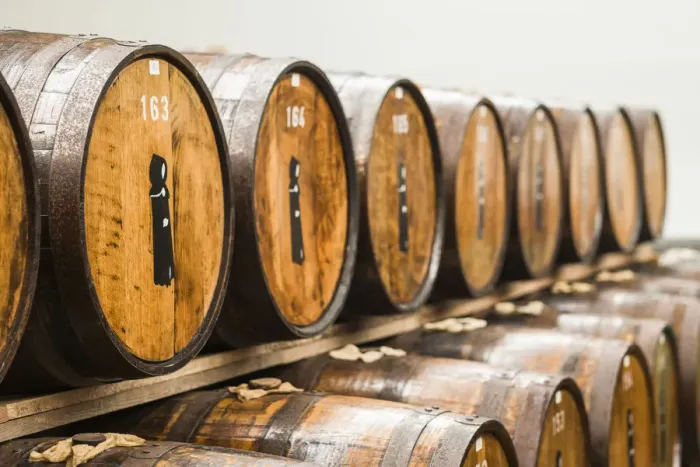 Framed Print : Portugal, Azores, Sao Miguel Island, Ribeira Grande. Mulher de Capote distillery, barrels