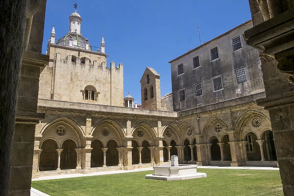 Portugal, Coimbra. Old Cathedral cloister. Archways, walking paths, courtyard