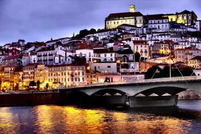 Framed Print : Portugal, Coimbra. Old Mondego River bridge and hillside view of Old University of Coimbra Framed Print : Portugal, Coimbra. Old Mondego River bridge and hillside view of Old University of Coimbra