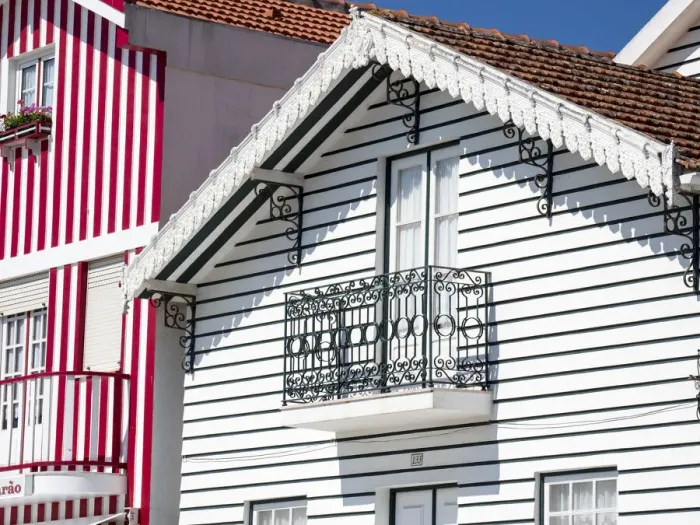 Framed Print : Portugal, Costa Nova. Colorful houses Palheiros striped homes