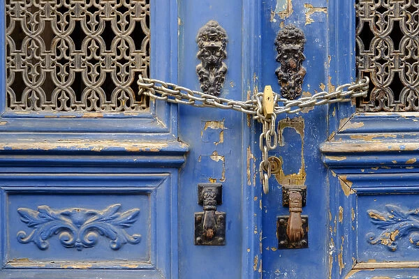 Portugal, Lisbon. Hostoric Alfama district, blue door with chain lock