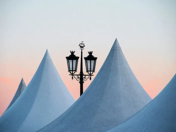 Framed Print : Portugal, Lisbon. Street lamp and top of artist tents at dusk in Commerce Square (Praca do Comercio) Framed Print : Portugal, Lisbon. Street lamp and top of artist tents at dusk in Commerce Square (Praca do Comercio)