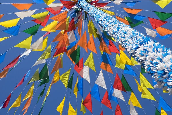 Portugal, Minho Province, Braga. Urban town squre, color flags decorate the area