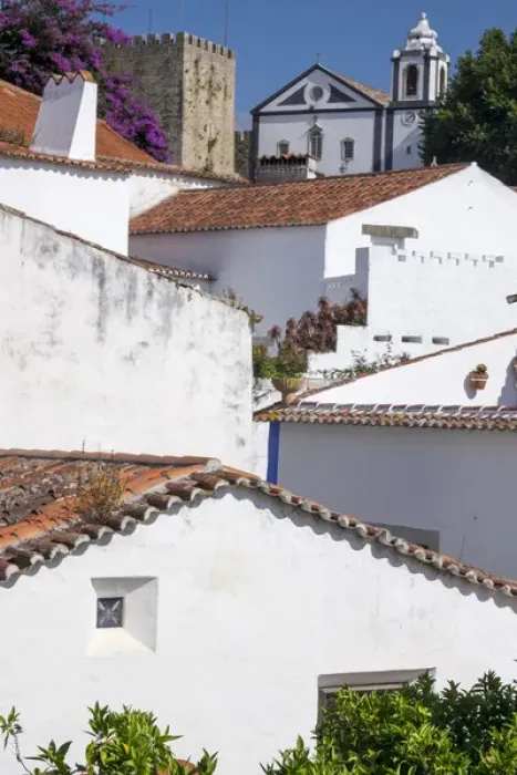 Framed Print : Portugal, Obidos. Ancient, red, terra cotta tiled roof tops, lines. Old windows Framed Print : Portugal, Obidos. Ancient, red, terra cotta tiled roof tops, lines. Old windows