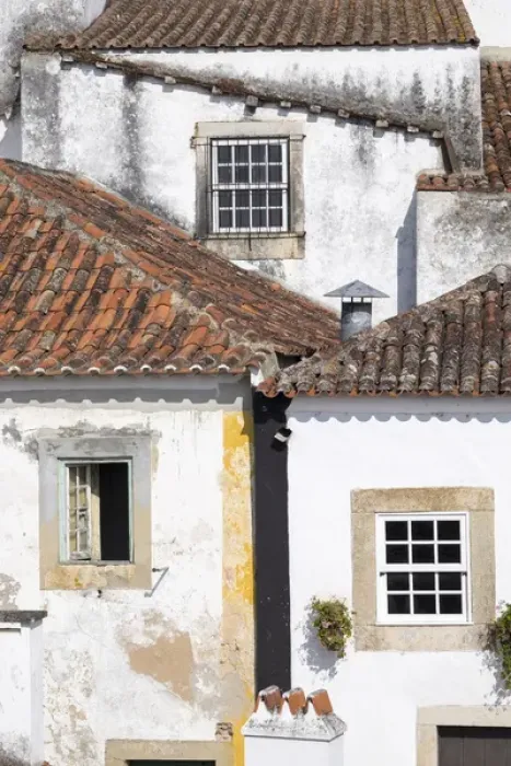 Framed Print : Portugal, Obidos. Ancient, red, terra cotta tiled roof tops, lines. Old windows Framed Print : Portugal, Obidos. Ancient, red, terra cotta tiled roof tops, lines. Old windows