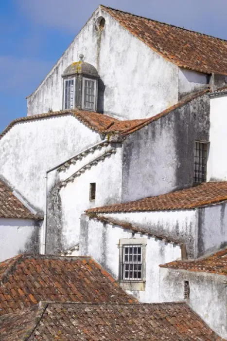 Framed Print : Portugal, Obidos. Ancient, red, terra cotta tiled roof tops, lines. Old windows