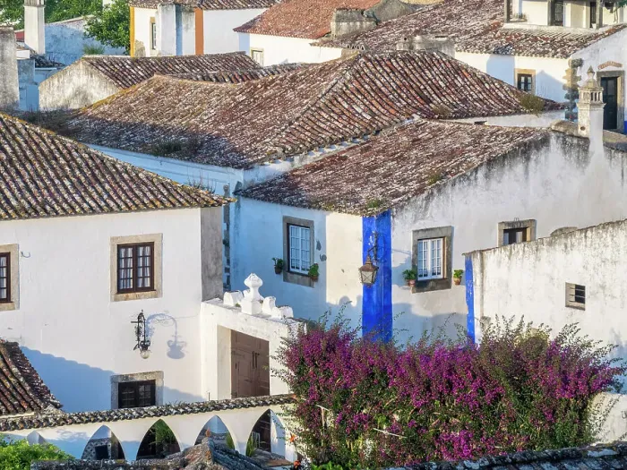 Framed Print : Portugal, Obidos. Elevated view of the town of Obidos with the terracotta tiled rooftops