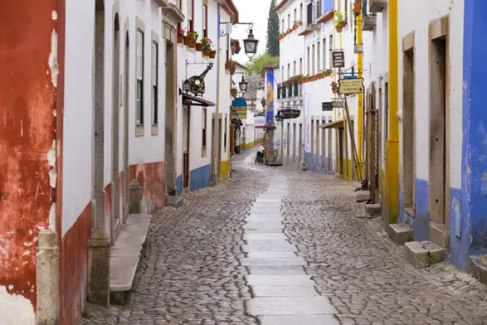 Framed Print : Portugal, Obidos. Leira District. Cobblestone walkways narrow neighborhood streets