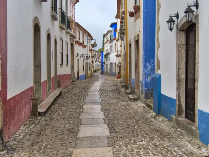 Framed Print : Portugal, Obidos. View looking down the main shopping street Framed Print : Portugal, Obidos. View looking down the main shopping street
