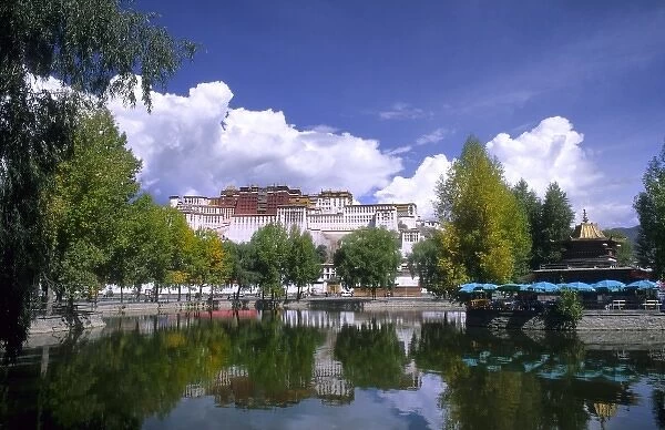 Potala Palace on mountain the home of the Dalai Lama with lake in capital city of