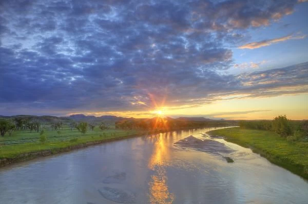 The Powder River catches last light in Custer County Montana