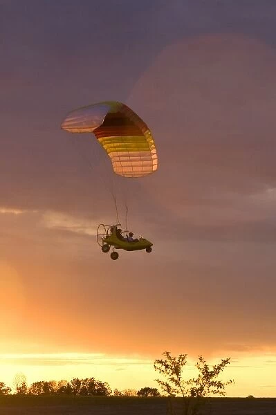 Powered parachute flying at sunset in Eaton County, Michigan