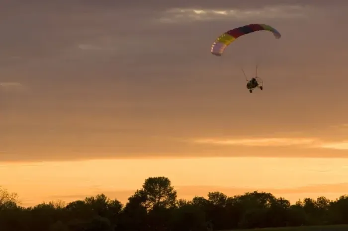 Framed Print : Powered parachute flying at sunset in Eaton County, Michigan