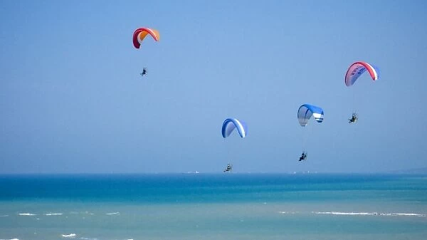 Four powered paragliders flying above the Black Sea in Istanbul, aerial, view, Turkey