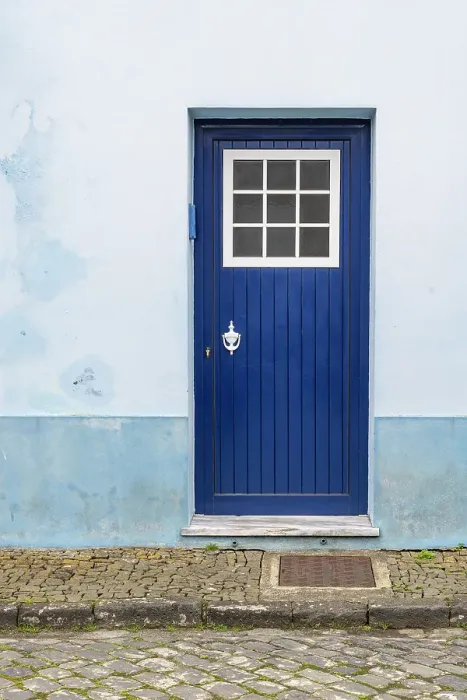 Framed Print : Praia da Vitoria, Terceira Island, Azores, Portugal. Blue door on a building Framed Print : Praia da Vitoria, Terceira Island, Azores, Portugal. Blue door on a building