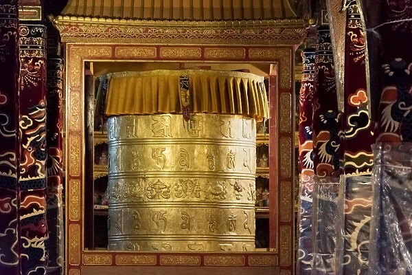 Prayer wheel inside Drepung Monastery, one of the great three Gelug university
