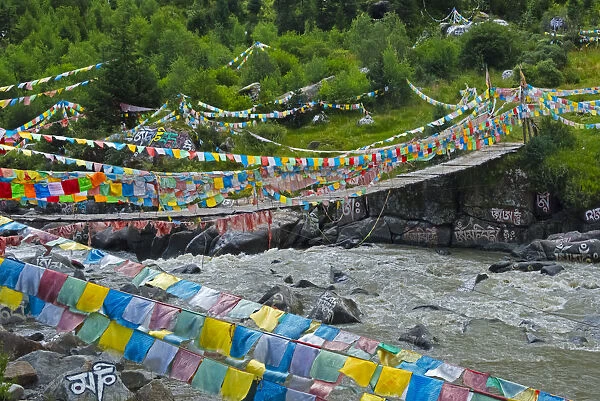 Praying flags across the river, Tagong, western Sichuan, China