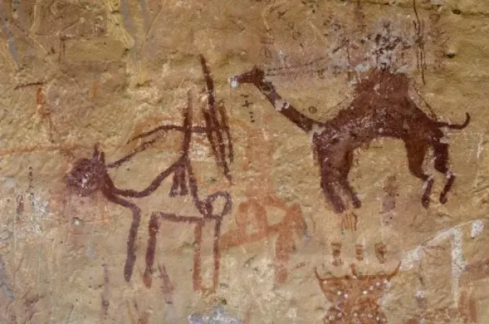 Framed Print : Prehistoric rock paintings with camels and hunters, Akakus, Sahara desert, Fezzan, Libya Framed Print : Prehistoric rock paintings with camels and hunters, Akakus, Sahara desert, Fezzan, Libya