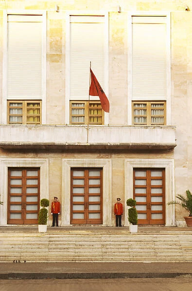 The presidential presidents palace with Albanian flag and honour guard. On the