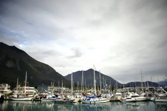 Framed Print : Private and Commercial Boats lie in Seward harbor amongst breaking skies Framed Print : Private and Commercial Boats lie in Seward harbor amongst breaking skies