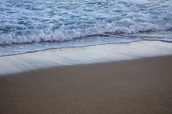 Puerto Rico, San Juan. Waves coming up on the beach