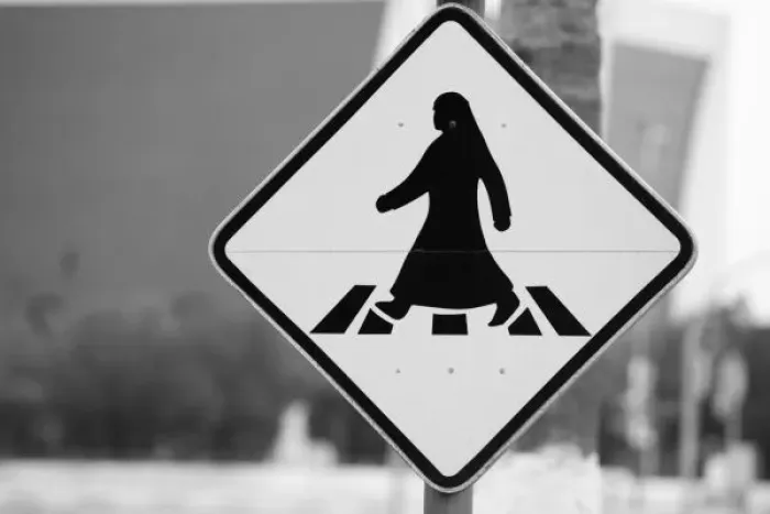 Framed Print : Qatar, Ad Dawhah, Doha. Arabian Pedestrian Crossing Sign  /  Al-Corniche Street