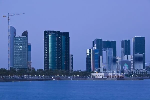 Qatar, Ad Dawhah, Doha. West Bay Development along the Corniche  /  Dusk