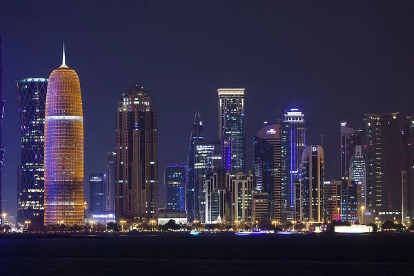 Qatar, Doha, Doha Bay, West Bay skyscrapers, dusk, with Burj Qatar Tower