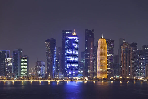 Qatar, Doha, Doha Bay, West Bay skyscrapers dawn, with World Trade Center in blue
