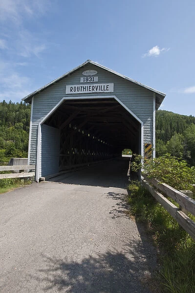 Quebec, Canada. De Routheirville covered bridge over the Matapedia River
