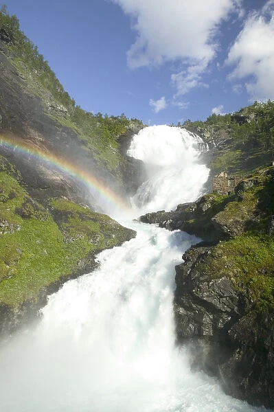 rainbow over KJpsfossen waterfall. The Flam Railway - an incredibel train journey
