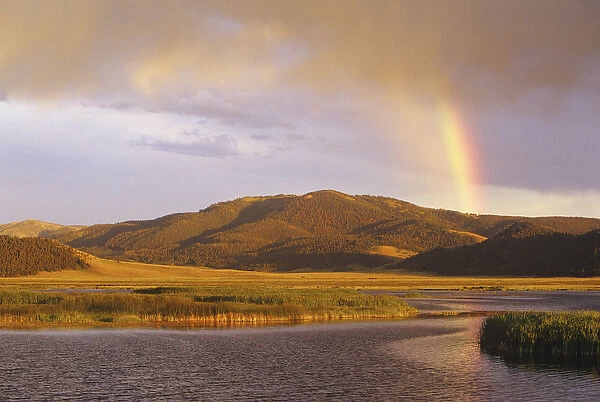 Rainbow over Widgeon Pond at the Red Rocks NWR, Montana, USA