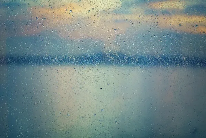 Framed Print : Raindrops on window with water view in background, Puget Sound, Washington State, USA Framed Print : Raindrops on window with water view in background, Puget Sound, Washington State, USA