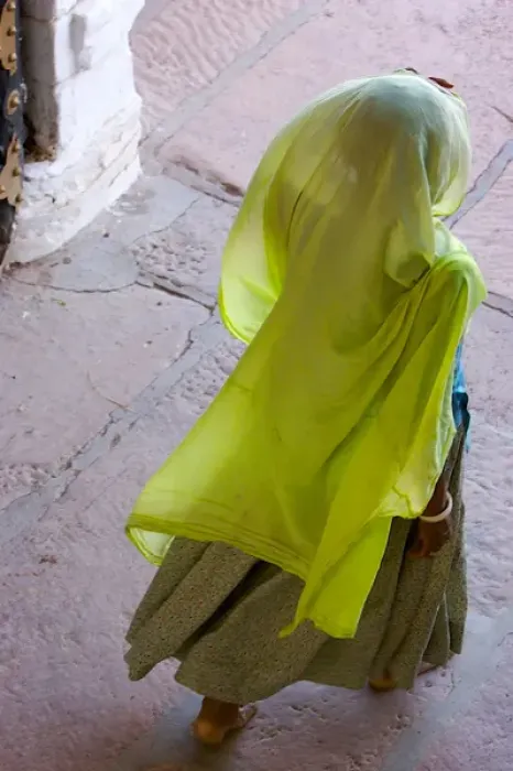 Framed Print : Rajasthan indian, A woman in a beautiful green scarf walking away Framed Print : Rajasthan indian, A woman in a beautiful green scarf walking away