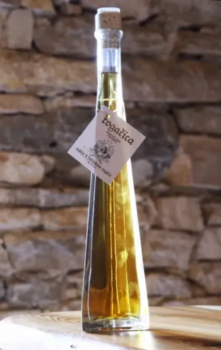 Framed Print : Rakija grappa type spirit flavoured with herbs backlit, Rogacica, Toreta Vinarija