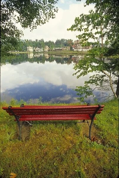 Red bench overlooking Flower Lake in the town of Saranac Lake in the Adirondacks