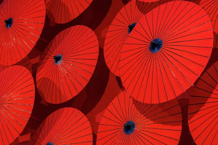 Framed Print : Red paper parasols on display, Arashiyama, Kyoto, Japan