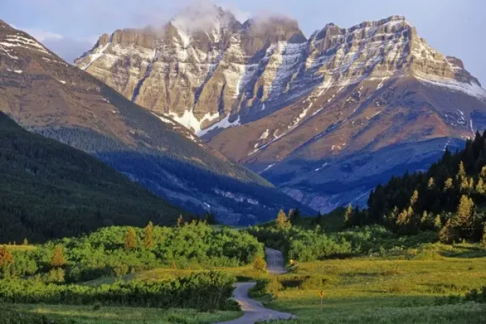 Framed Print : Red Rock Parkway winds to Blakiston Mountainin Waterton Lakes National Park in Alberta