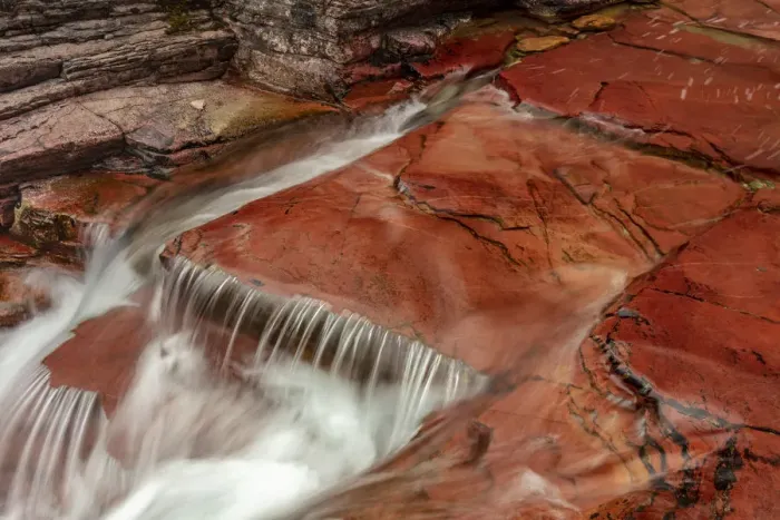 Framed Print : Red rocks at the bottom of Virginia Creek in Glacier National Park, Montana, USA Framed Print : Red rocks at the bottom of Virginia Creek in Glacier National Park, Montana, USA