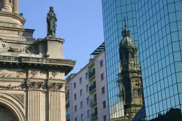 Framed Print : Reflection of Cathedral Metropolitana on blue glass of modern highrise, Plaza de Armas