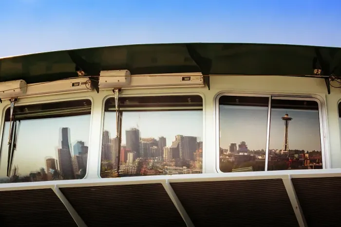 Framed Print : Reflection of Seattle skyline waterfront in ferry window, Washington State, USA Framed Print : Reflection of Seattle skyline waterfront in ferry window, Washington State, USA