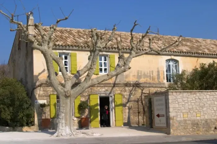 Framed Print : The restaurant Bistrot La Petite France in Le Paradou with a naked tree and a person Framed Print : The restaurant Bistrot La Petite France in Le Paradou with a naked tree and a person