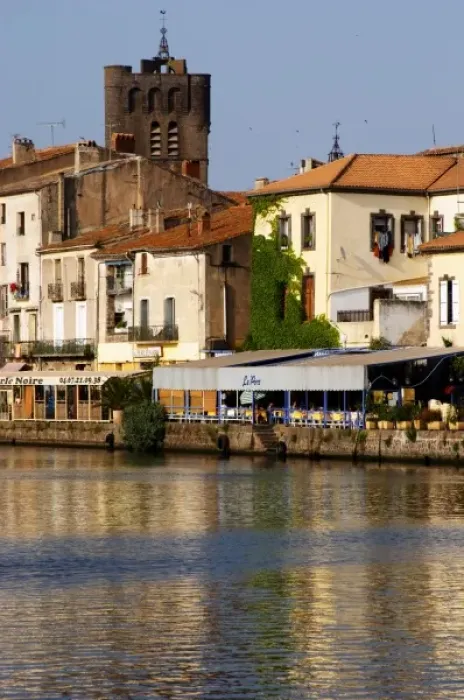 Framed Print : Restaurants along the l Herault river. L Herault river. Agde town. Languedoc