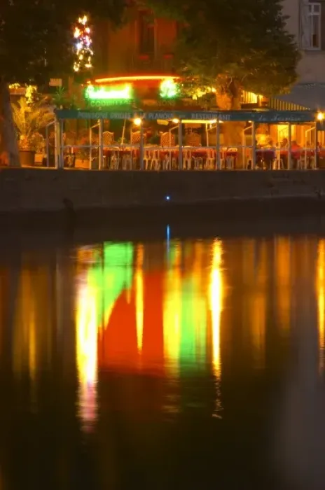 Framed Print : Restaurants along the l Herault river. L Herault river. Agde town. Languedoc